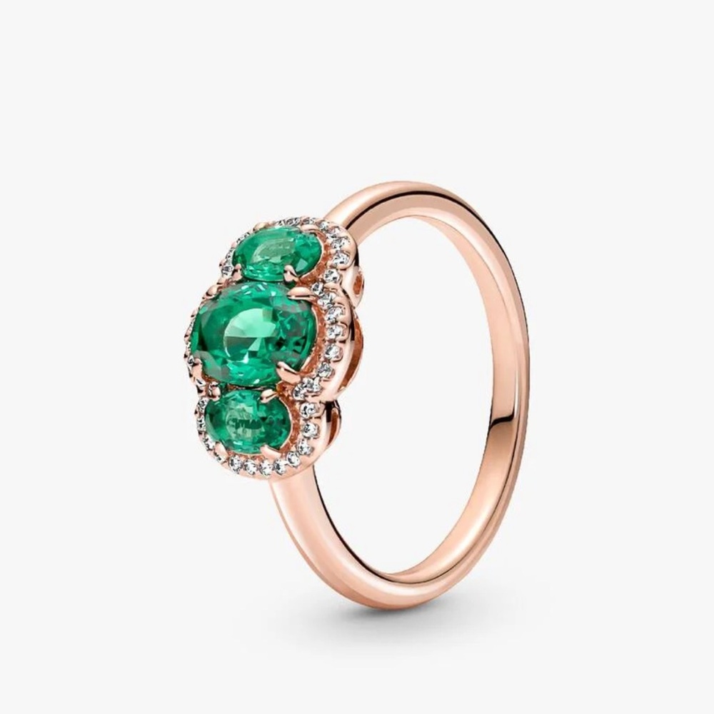 Pandora ring size 52 /6 in a 14k rose gold-plating with green three stones